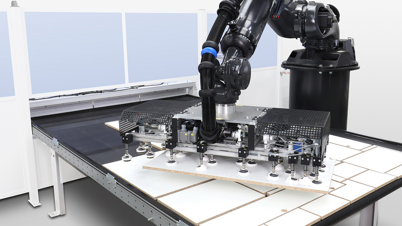 Selecção a partir do ninho – empilhamento automático graças à possibilidade de Integração do robot