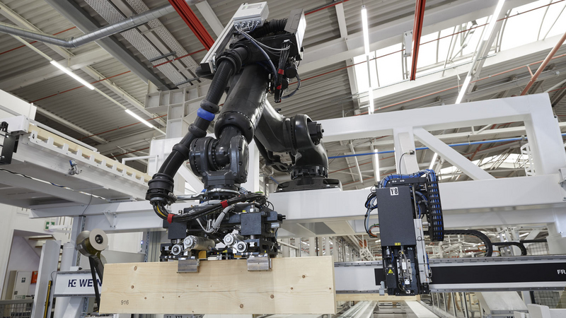 WEINMANN production line with robots for prefabricated house construction smartPrefab at WeberHaus