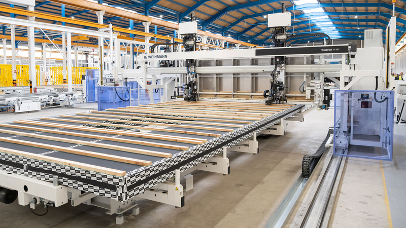 The multifunction bridge with the integrated batten support enables the fully automatic placement of the roof battens on the element. Copyright: Lignumtech