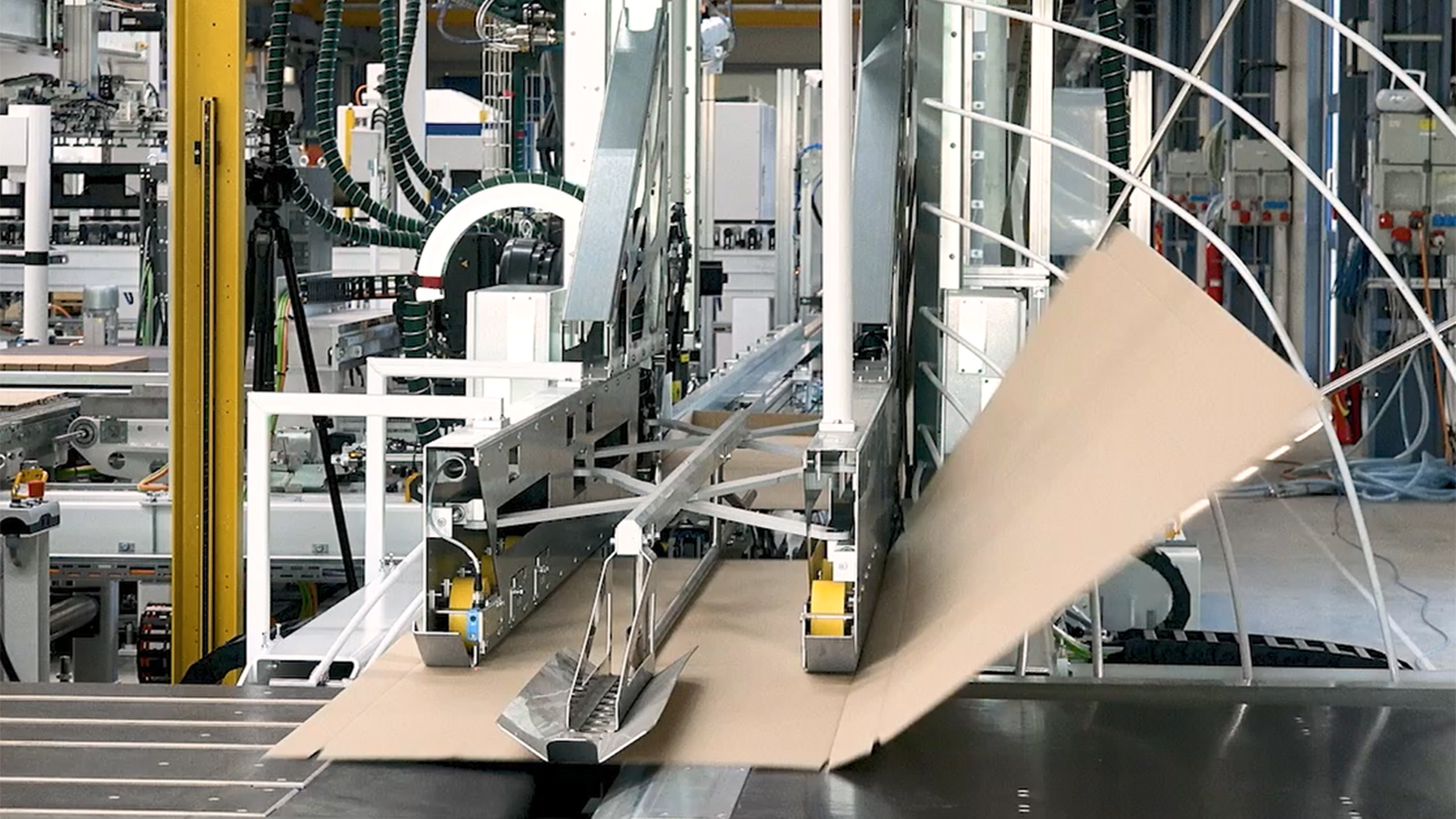 Raising the cardboard lid